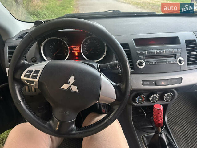 Черный Мицубиси Лансер, объемом двигателя 1.5 л и пробегом 202 тыс. км за 6500 $, фото 34 на Automoto.ua