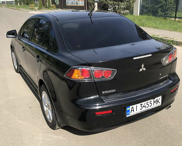 Чорний Міцубісі Lancer, об'ємом двигуна 1.5 л та пробігом 131 тис. км за 8000 $, фото 2 на Automoto.ua