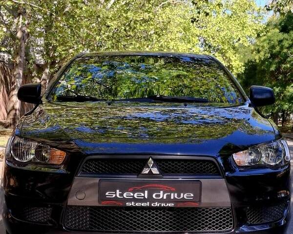 Чорний Міцубісі Lancer, об'ємом двигуна 1.5 л та пробігом 90 тис. км за 7699 $, фото 1 на Automoto.ua