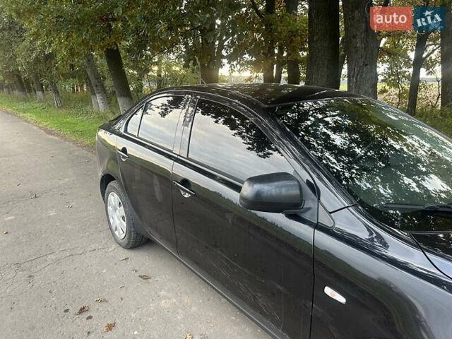 Черный Мицубиси Лансер, объемом двигателя 1.5 л и пробегом 202 тыс. км за 6500 $, фото 19 на Automoto.ua