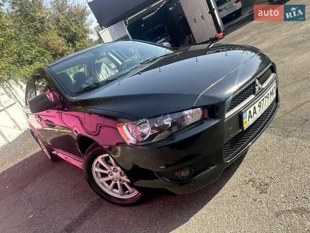 Черный Мицубиси Лансер, объемом двигателя 2 л и пробегом 158 тыс. км за 10800 $, фото 3 на Automoto.ua