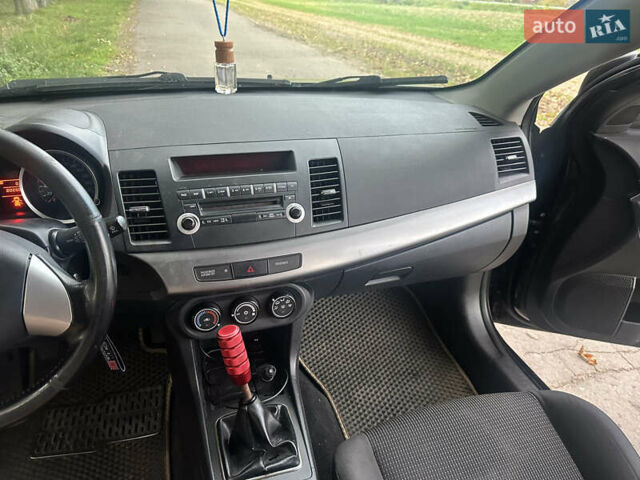 Черный Мицубиси Лансер, объемом двигателя 1.5 л и пробегом 202 тыс. км за 6500 $, фото 39 на Automoto.ua