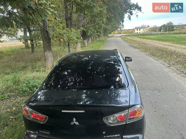Черный Мицубиси Лансер, объемом двигателя 1.5 л и пробегом 202 тыс. км за 6500 $, фото 25 на Automoto.ua