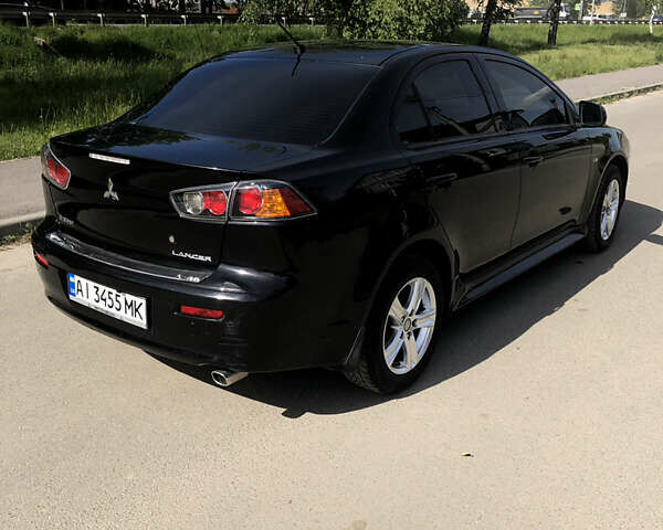 Чорний Міцубісі Lancer, об'ємом двигуна 1.5 л та пробігом 131 тис. км за 8000 $, фото 4 на Automoto.ua