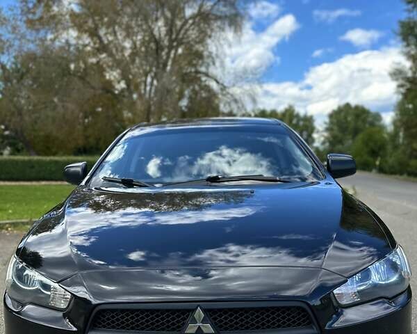 Чорний Міцубісі Lancer, об'ємом двигуна 1.5 л та пробігом 187 тис. км за 6800 $, фото 2 на Automoto.ua
