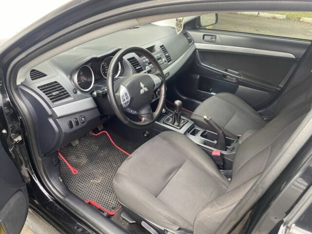 Міцубісі Lancer 2011 у Полтаві на Automoto.ua Чорний Міцубісі Lancer, об'ємом двигуна 1.5 л та пробігом 240 тис. км за 6300 $, фото 3 на Automoto.ua