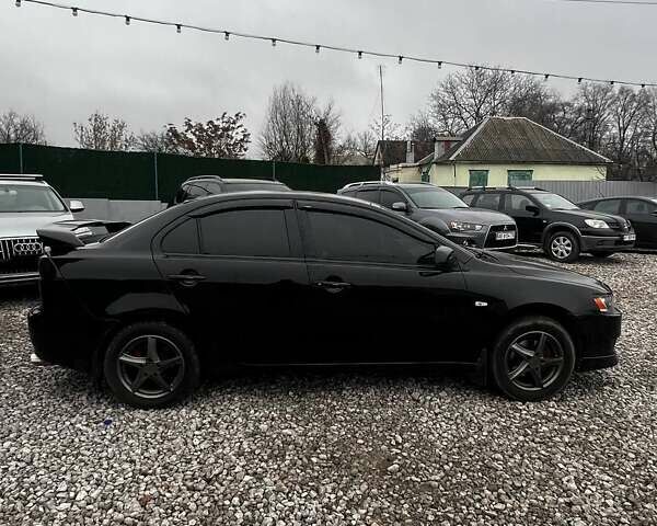 Черный Мицубиси Лансер, объемом двигателя 1.5 л и пробегом 250 тыс. км за 4800 $, фото 6 на Automoto.ua