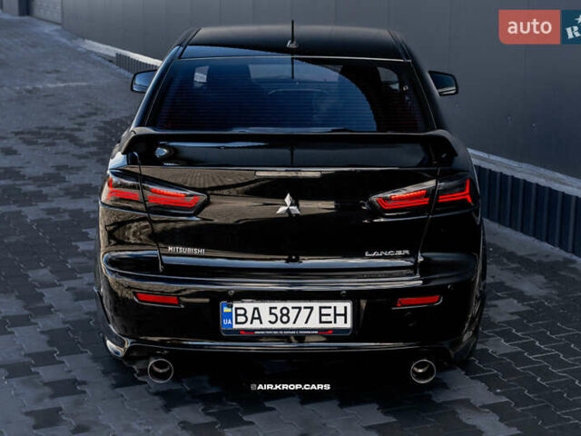 Чорний Міцубісі Lancer, об'ємом двигуна 2 л та пробігом 204 тис. км за 9500 $, фото 1 на Automoto.ua