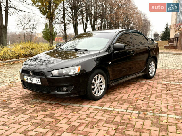 Черный Мицубиси Лансер, объемом двигателя 2 л и пробегом 169 тыс. км за 6800 $, фото 2 на Automoto.ua