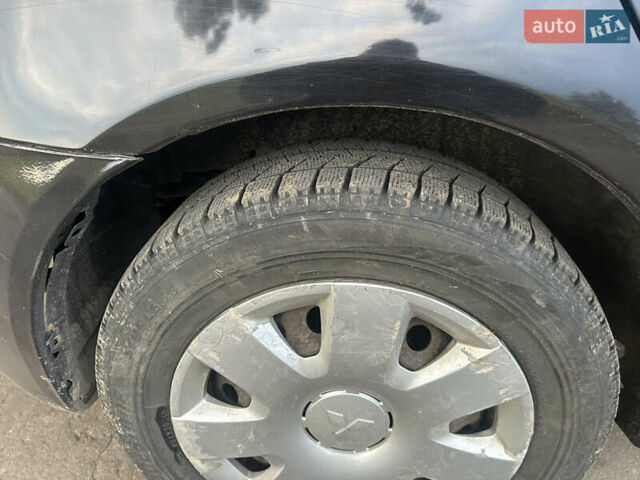 Черный Мицубиси Лансер, объемом двигателя 1.5 л и пробегом 202 тыс. км за 6500 $, фото 21 на Automoto.ua