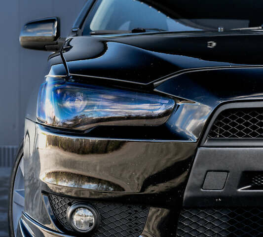 Чорний Міцубісі Lancer, об'ємом двигуна 2 л та пробігом 204 тис. км за 9500 $, фото 18 на Automoto.ua