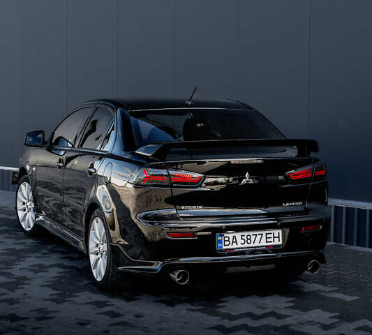 Чорний Міцубісі Lancer, об'ємом двигуна 2 л та пробігом 204 тис. км за 9500 $, фото 20 на Automoto.ua