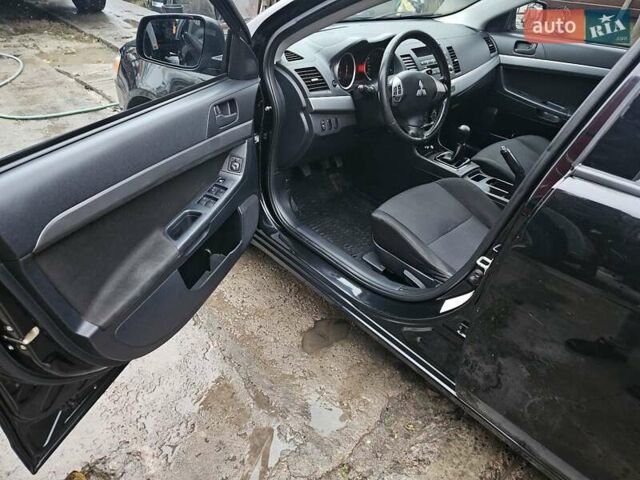 Черный Мицубиси Лансер, объемом двигателя 1.5 л и пробегом 222 тыс. км за 4900 $, фото 20 на Automoto.ua