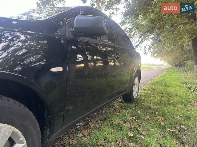 Черный Мицубиси Лансер, объемом двигателя 1.5 л и пробегом 202 тыс. км за 6500 $, фото 18 на Automoto.ua