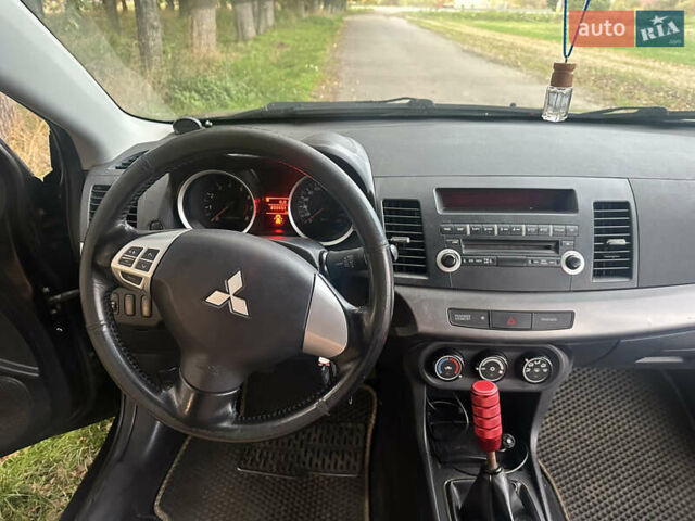 Черный Мицубиси Лансер, объемом двигателя 1.5 л и пробегом 202 тыс. км за 6500 $, фото 41 на Automoto.ua