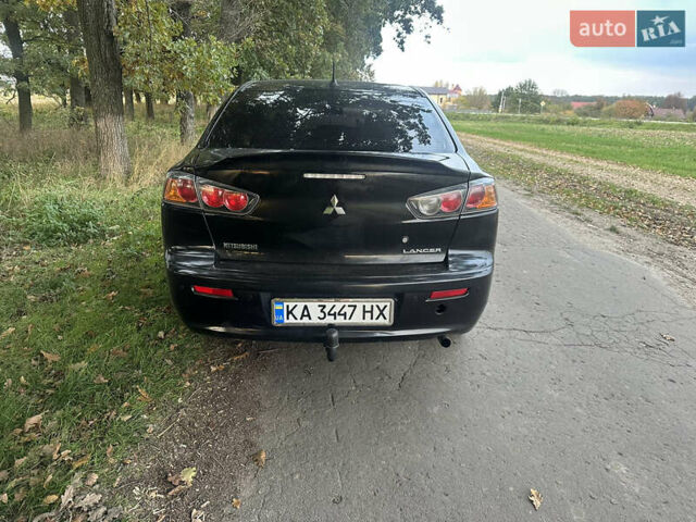 Черный Мицубиси Лансер, объемом двигателя 1.5 л и пробегом 202 тыс. км за 6500 $, фото 11 на Automoto.ua