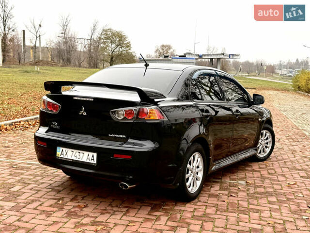 Черный Мицубиси Лансер, объемом двигателя 2 л и пробегом 169 тыс. км за 6800 $, фото 12 на Automoto.ua