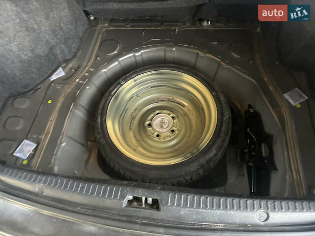 Черный Мицубиси Лансер, объемом двигателя 1.5 л и пробегом 202 тыс. км за 6500 $, фото 49 на Automoto.ua