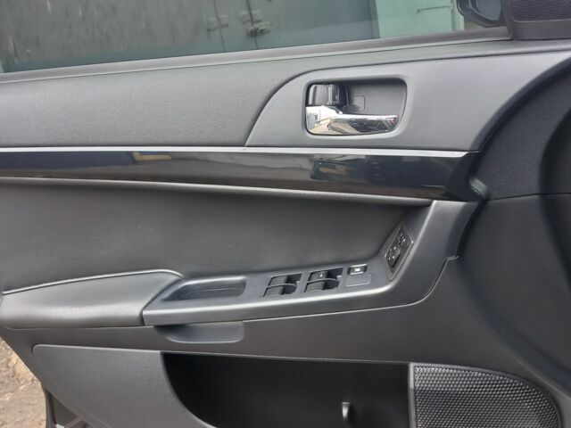 Черный Мицубиси Лансер, объемом двигателя 1.6 л и пробегом 102 тыс. км за 6500 $, фото 10 на Automoto.ua