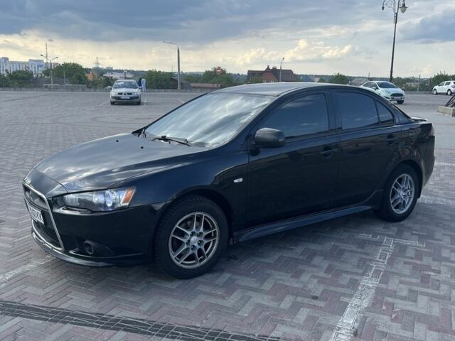 Чорний Міцубісі Lancer, об'ємом двигуна 1.6 л та пробігом 200 тис. км за 7500 $, фото 3 на Automoto.ua