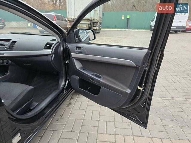 Чорний Міцубісі Lancer, об'ємом двигуна 1.5 л та пробігом 223 тис. км за 5500 $, фото 22 на Automoto.ua