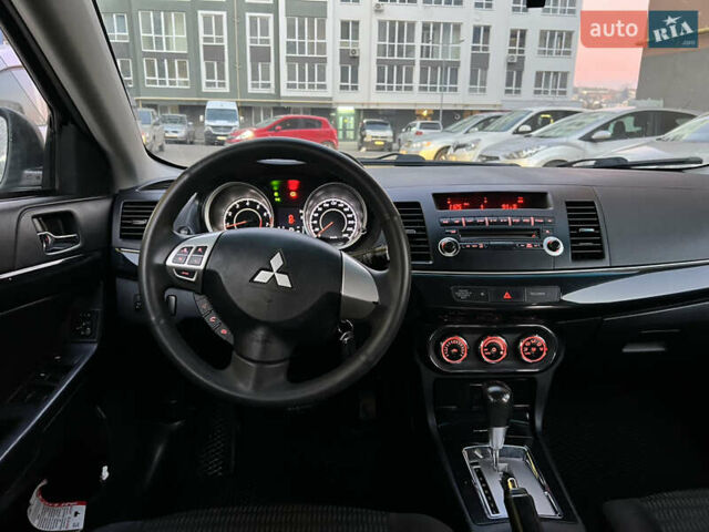Черный Мицубиси Лансер, объемом двигателя 1.59 л и пробегом 186 тыс. км за 7300 $, фото 20 на Automoto.ua