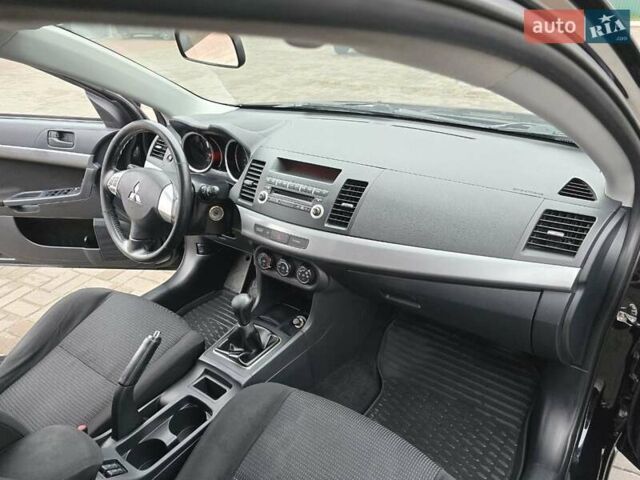Чорний Міцубісі Lancer, об'ємом двигуна 1.5 л та пробігом 223 тис. км за 5500 $, фото 16 на Automoto.ua