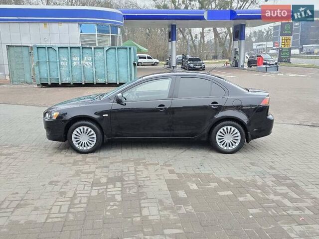 Чорний Міцубісі Lancer, об'ємом двигуна 1.5 л та пробігом 223 тис. км за 5500 $, фото 4 на Automoto.ua
