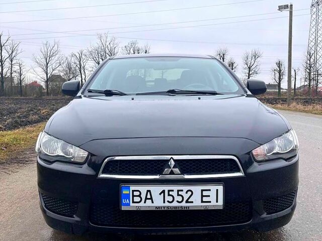 Чорний Міцубісі Lancer, об'ємом двигуна 2 л та пробігом 123 тис. км за 9000 $, фото 3 на Automoto.ua