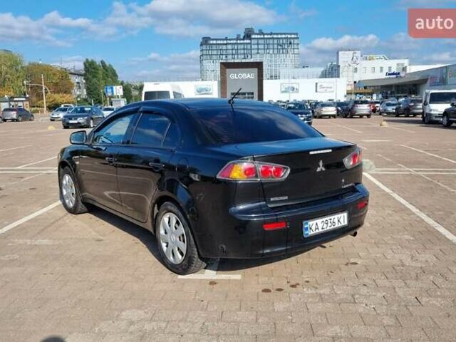 Чорний Міцубісі Lancer, об'ємом двигуна 1.59 л та пробігом 191 тис. км за 5900 $, фото 6 на Automoto.ua