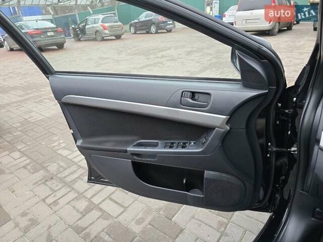 Чорний Міцубісі Lancer, об'ємом двигуна 1.5 л та пробігом 223 тис. км за 5500 $, фото 21 на Automoto.ua