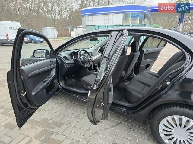 Чорний Міцубісі Lancer, об'ємом двигуна 1.5 л та пробігом 223 тис. км за 5500 $, фото 24 на Automoto.ua
