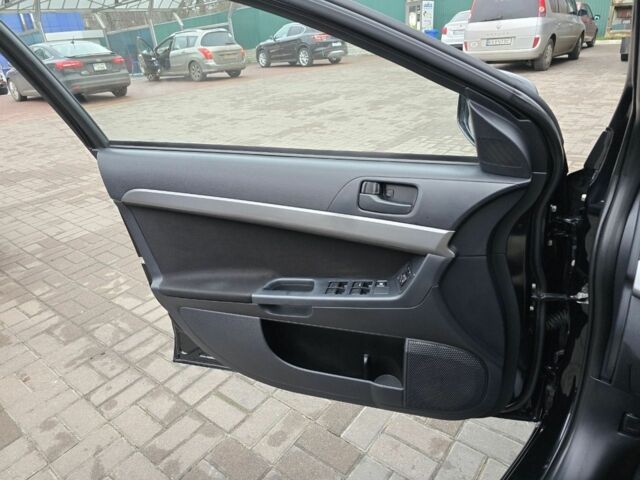 Черный Мицубиси Лансер, объемом двигателя 2 л и пробегом 223 тыс. км за 5500 $, фото 15 на Automoto.ua