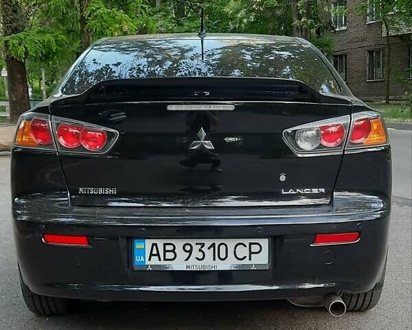 Чорний Міцубісі Lancer, об'ємом двигуна 1.6 л та пробігом 121 тис. км за 8999 $, фото 6 на Automoto.ua