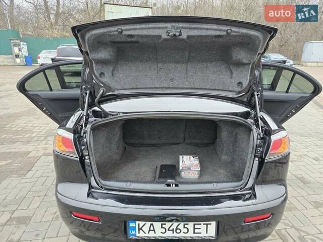 Чорний Міцубісі Lancer, об'ємом двигуна 1.5 л та пробігом 223 тис. км за 5500 $, фото 25 на Automoto.ua