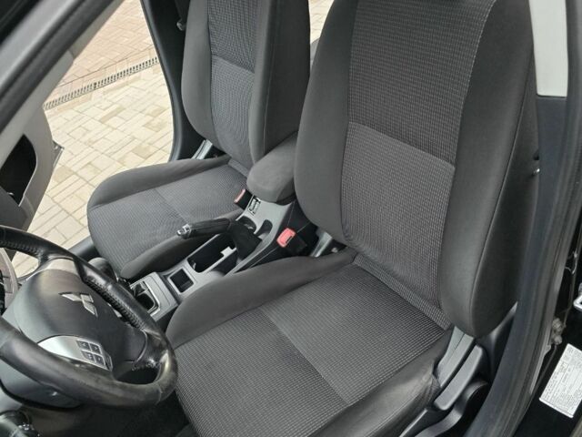 Черный Мицубиси Лансер, объемом двигателя 2 л и пробегом 223 тыс. км за 5500 $, фото 12 на Automoto.ua