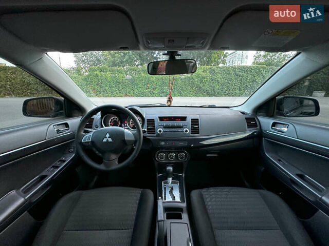 Чорний Міцубісі Lancer, об'ємом двигуна 1.59 л та пробігом 146 тис. км за 8950 $, фото 17 на Automoto.ua