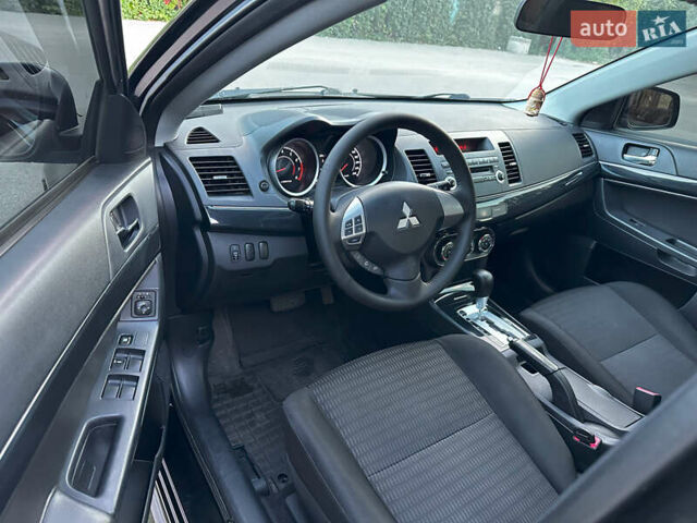 Чорний Міцубісі Lancer, об'ємом двигуна 1.59 л та пробігом 146 тис. км за 8950 $, фото 16 на Automoto.ua