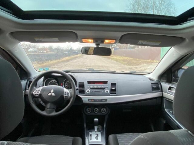 Чорний Міцубісі Lancer, об'ємом двигуна 2 л та пробігом 50 тис. км за 8300 $, фото 4 на Automoto.ua