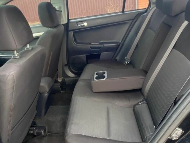 Чорний Міцубісі Lancer, об'ємом двигуна 2 л та пробігом 50 тис. км за 8300 $, фото 5 на Automoto.ua