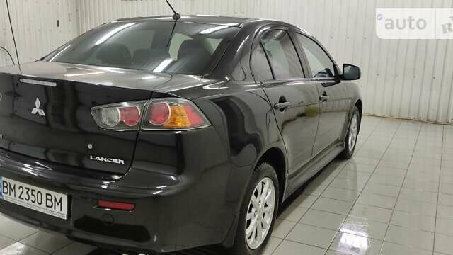 Чорний Міцубісі Lancer, об'ємом двигуна 1.59 л та пробігом 126 тис. км за 8600 $, фото 5 на Automoto.ua