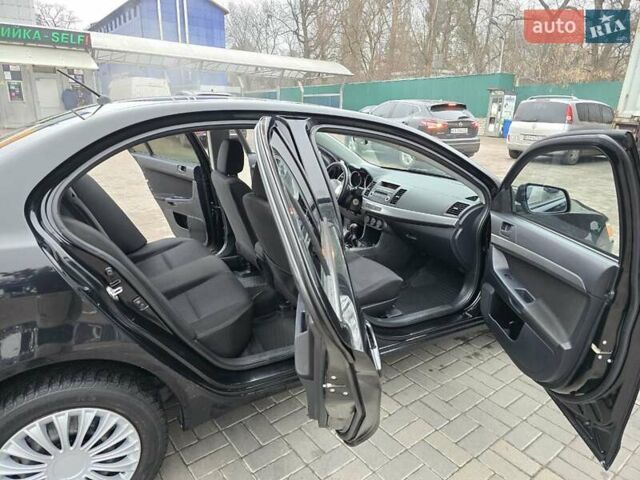 Чорний Міцубісі Lancer, об'ємом двигуна 1.5 л та пробігом 223 тис. км за 5500 $, фото 23 на Automoto.ua