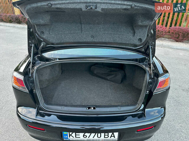 Чорний Міцубісі Lancer, об'ємом двигуна 1.59 л та пробігом 146 тис. км за 8950 $, фото 28 на Automoto.ua