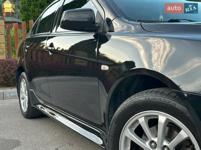 Чорний Міцубісі Lancer, об'ємом двигуна 1.59 л та пробігом 146 тис. км за 8950 $, фото 11 на Automoto.ua