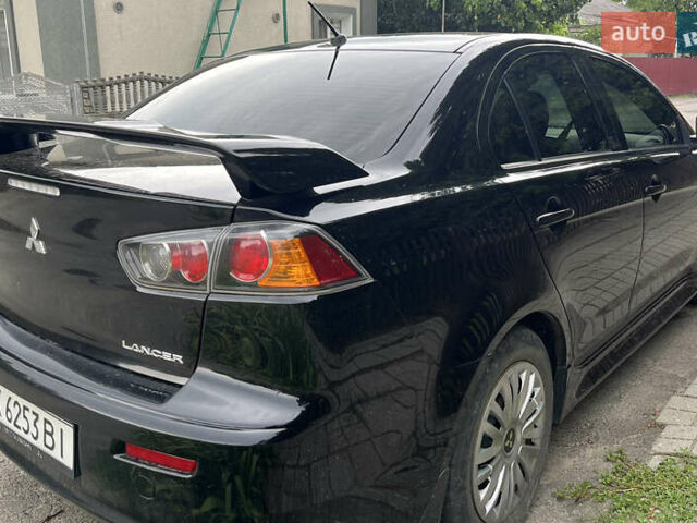 Черный Мицубиси Лансер, объемом двигателя 1.8 л и пробегом 224 тыс. км за 7300 $, фото 5 на Automoto.ua