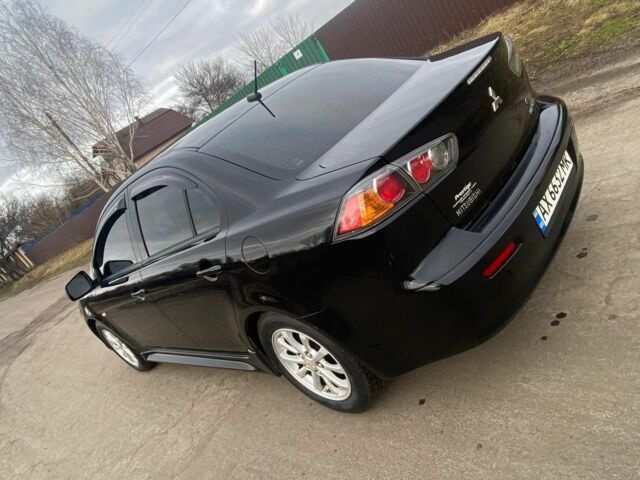 Чорний Міцубісі Lancer, об'ємом двигуна 2 л та пробігом 50 тис. км за 8300 $, фото 1 на Automoto.ua