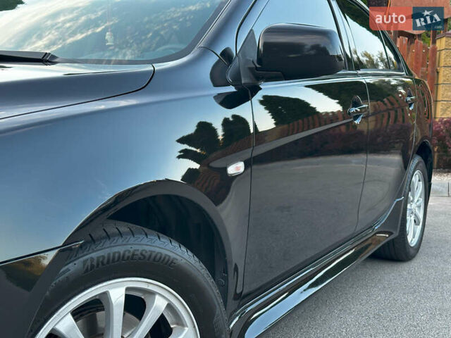 Чорний Міцубісі Lancer, об'ємом двигуна 1.59 л та пробігом 146 тис. км за 8950 $, фото 10 на Automoto.ua