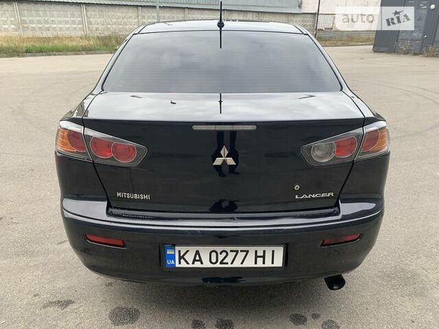 Чорний Міцубісі Lancer, об'ємом двигуна 1.6 л та пробігом 177 тис. км за 7300 $, фото 11 на Automoto.ua