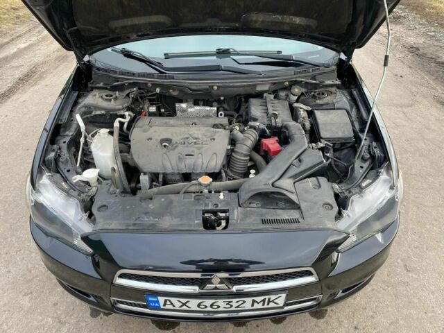 Чорний Міцубісі Lancer, об'ємом двигуна 2 л та пробігом 50 тис. км за 8300 $, фото 6 на Automoto.ua