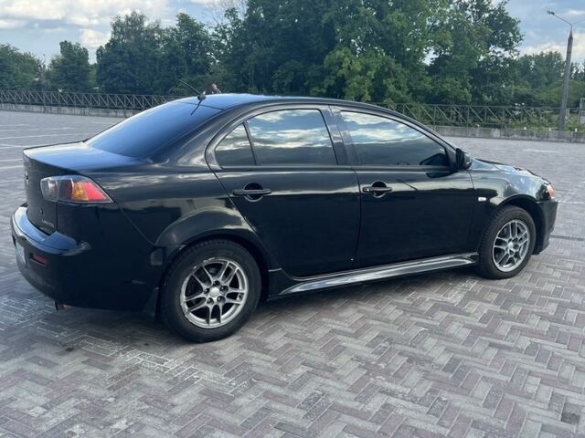 Чорний Міцубісі Lancer, об'ємом двигуна 1.6 л та пробігом 200 тис. км за 7500 $, фото 7 на Automoto.ua